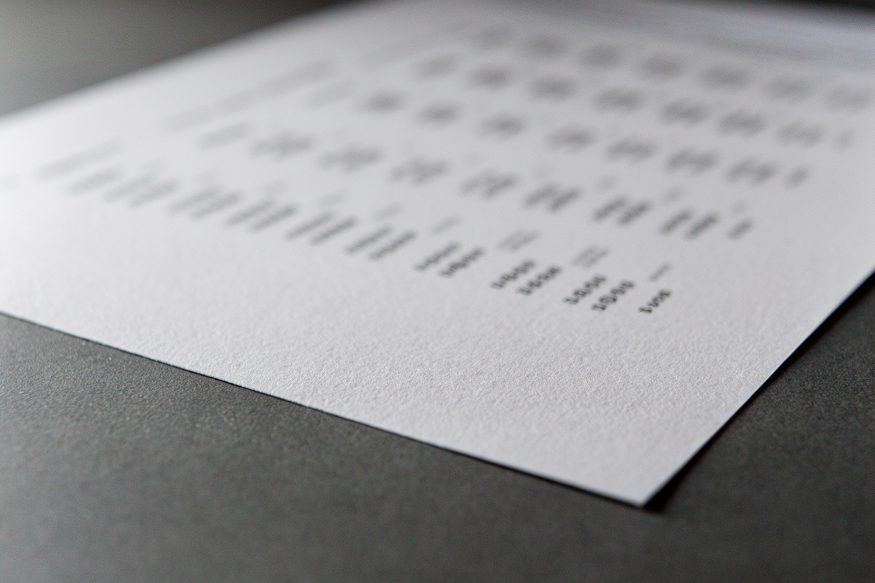 Printed statement page under raking light